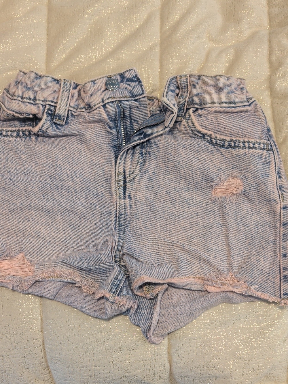 High-Rise Light Pink Distressed Denim Shorts